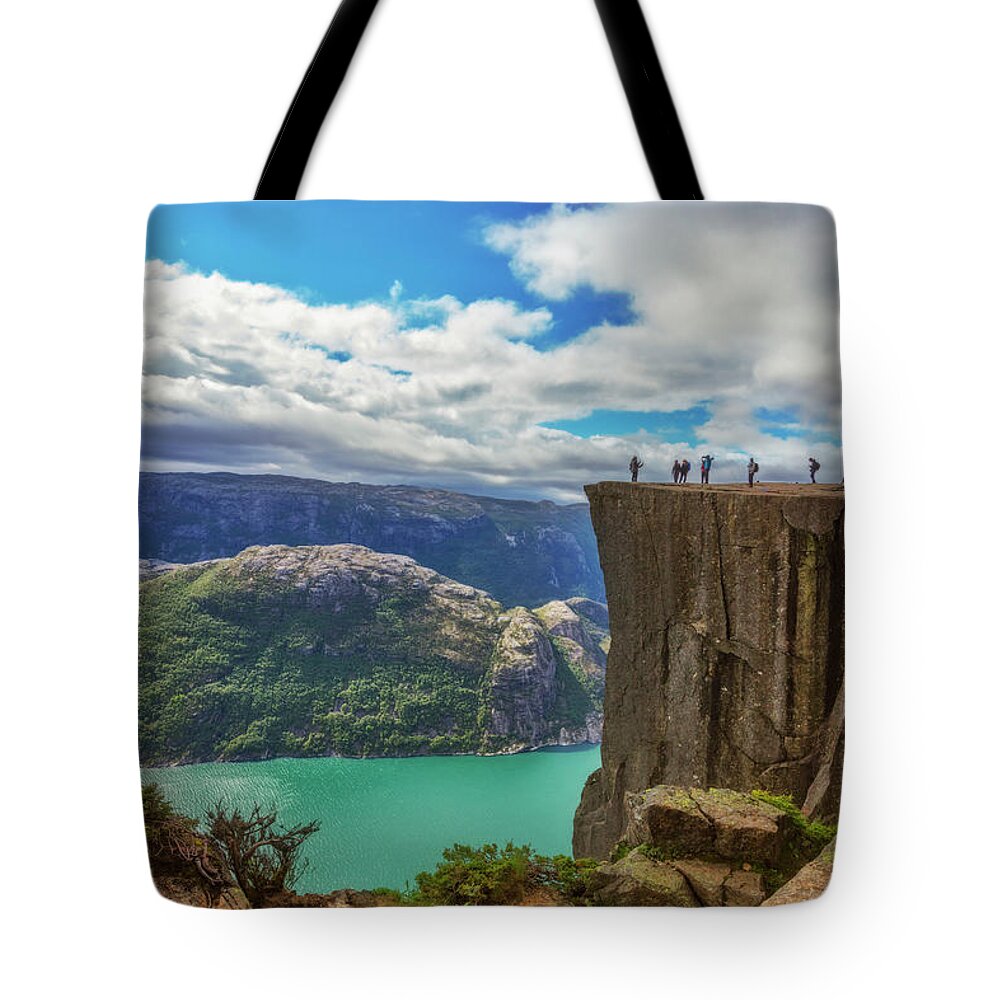 Clouds Tote Bag featuring the photograph Preikestolen The Pulpit Rock by Debra and Dave Vanderlaan