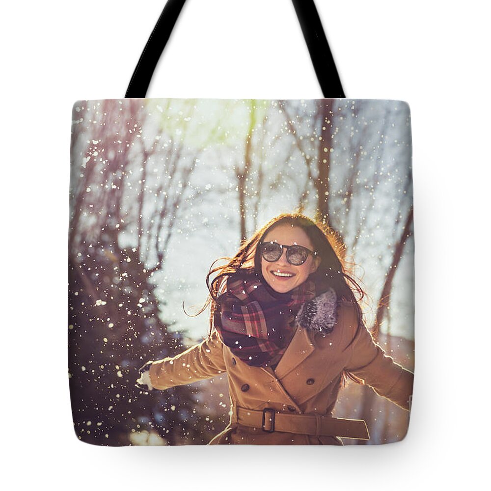 Active Tote Bag featuring the photograph Pretty girl in winter park by Anna Om
