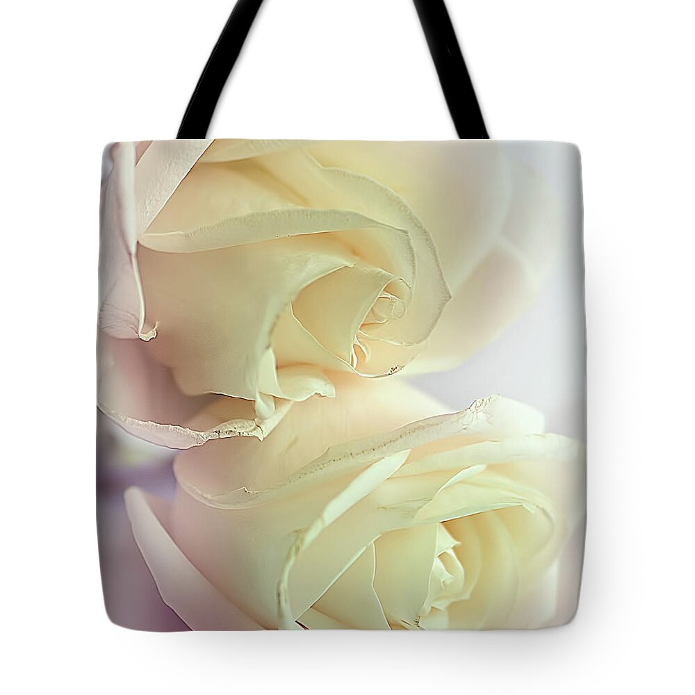 Roses Tote Bag featuring the photograph Pretty wilting white roses with pink tinge by Cordia Murphy