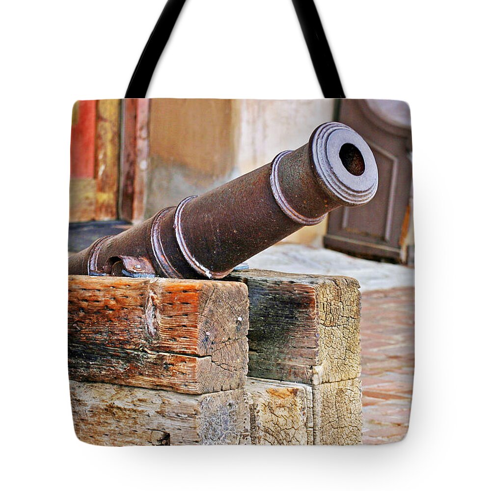 Canon Tote Bag featuring the photograph Protecting the Mission by Anthony Jones