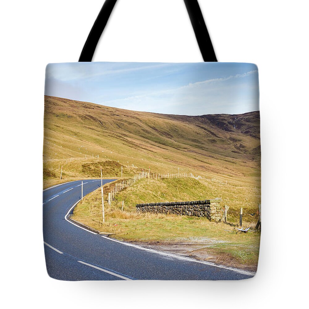 Cairngorms Tote Bag featuring the photograph Quiet Road by Tanya C Smith