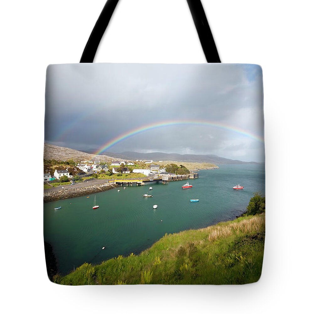 Scenics Tote Bag featuring the photograph Rainbow In The Outer Hebrides Tarbert by Nicolamargaret