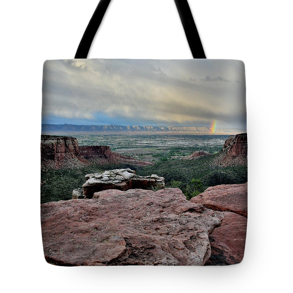 Colorado National Monument Tote Bag featuring the photograph Rainbow over Book Cliffs from Grand View Point by Ray Mathis