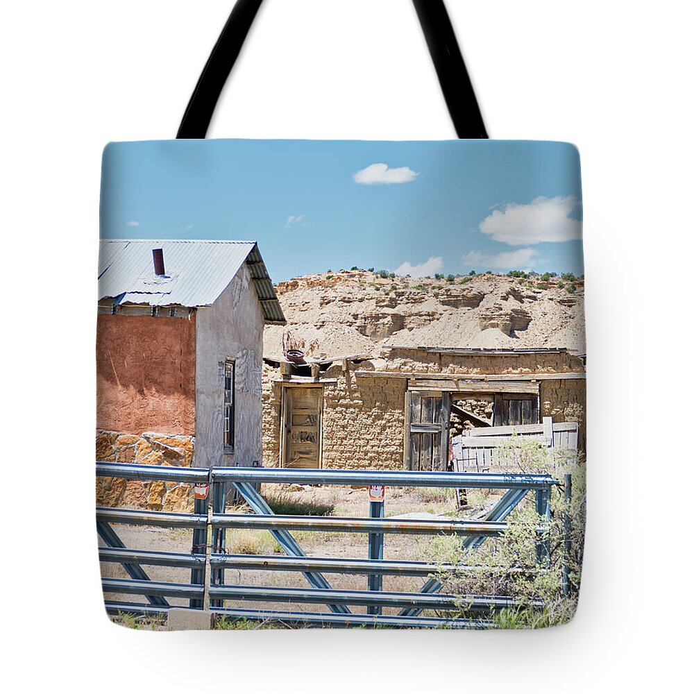 Cabezon Tote Bag featuring the photograph Ranch buildings against bluffs by Segura Shaw Photography