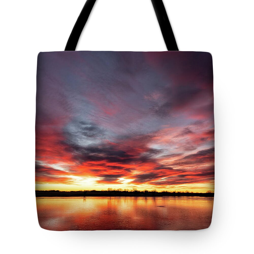 Sunrise Tote Bag featuring the photograph Red, Blue and Orange Sunrise in Colorado by Tony Hake
