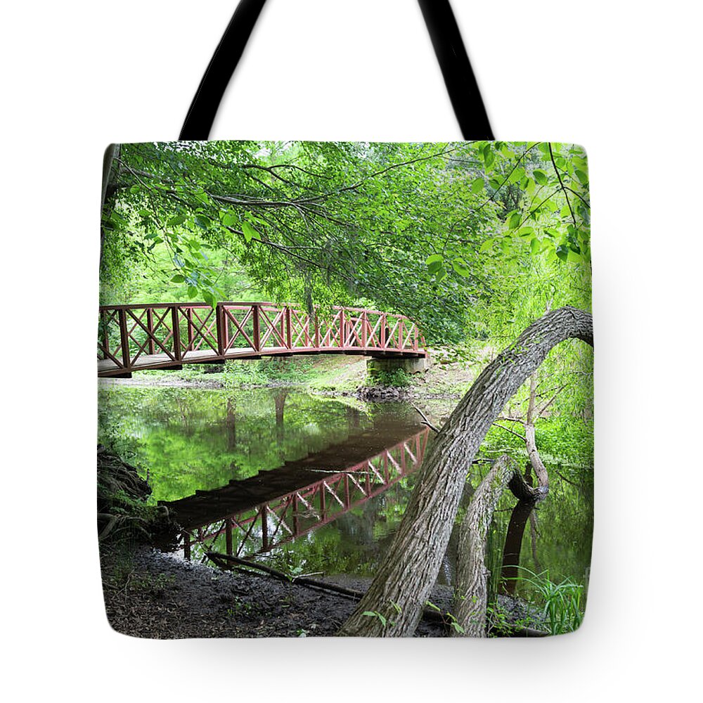 Footbridge Tote Bag featuring the photograph Red Bridge Over Peaceful Water by MM Anderson