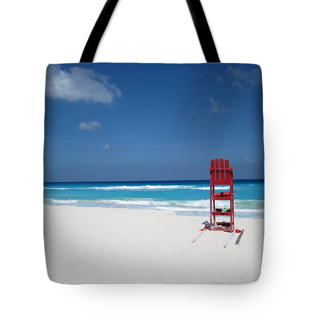 Shadow Tote Bag featuring the photograph Red Chair On A Beach In Cancun by Ben Beiske