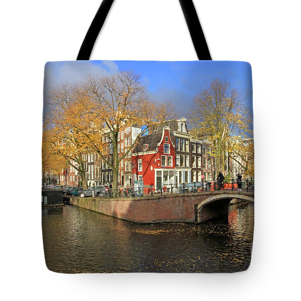 Merchant Houses Tote Bag featuring the photograph Red Merchant House by Paula Guttilla
