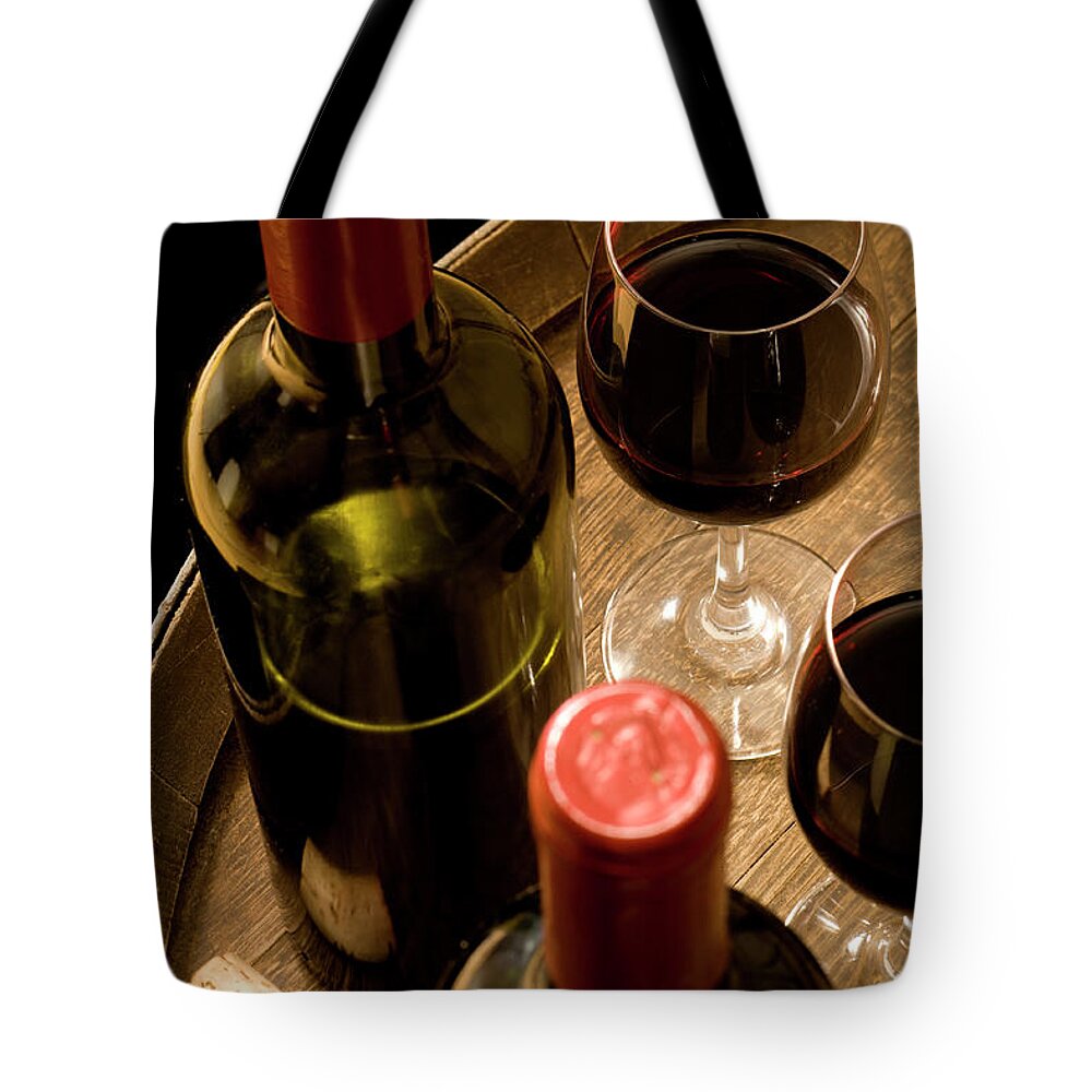 Alcohol Tote Bag featuring the photograph Red Wine by Markswallow