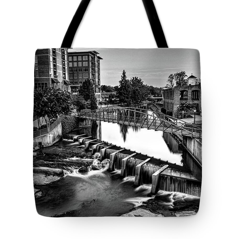 Downtown Greenville Tote Bag featuring the photograph Reedy River In Downtown Greenville SC Black And White by Carol Montoya