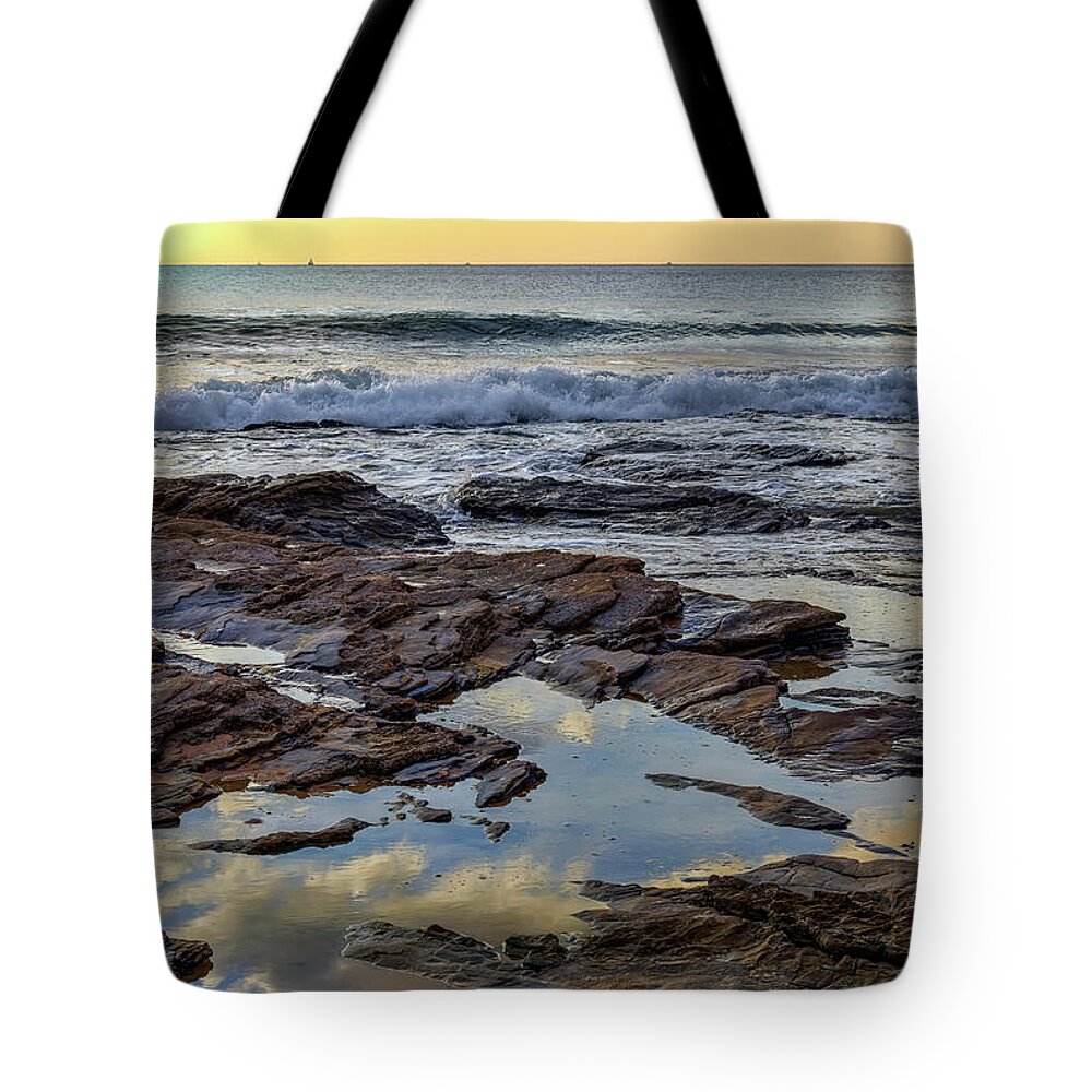 Reflections Tote Bag featuring the photograph Reflections on the Rocks by Eddie Yerkish
