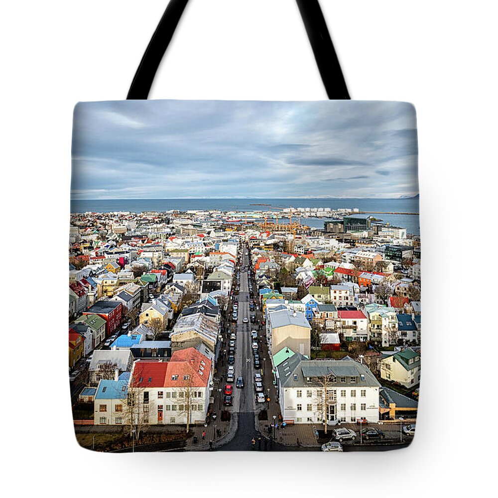 Hallgrimskirkja Tote Bag featuring the photograph Reykjavik City 1 by Nigel R Bell