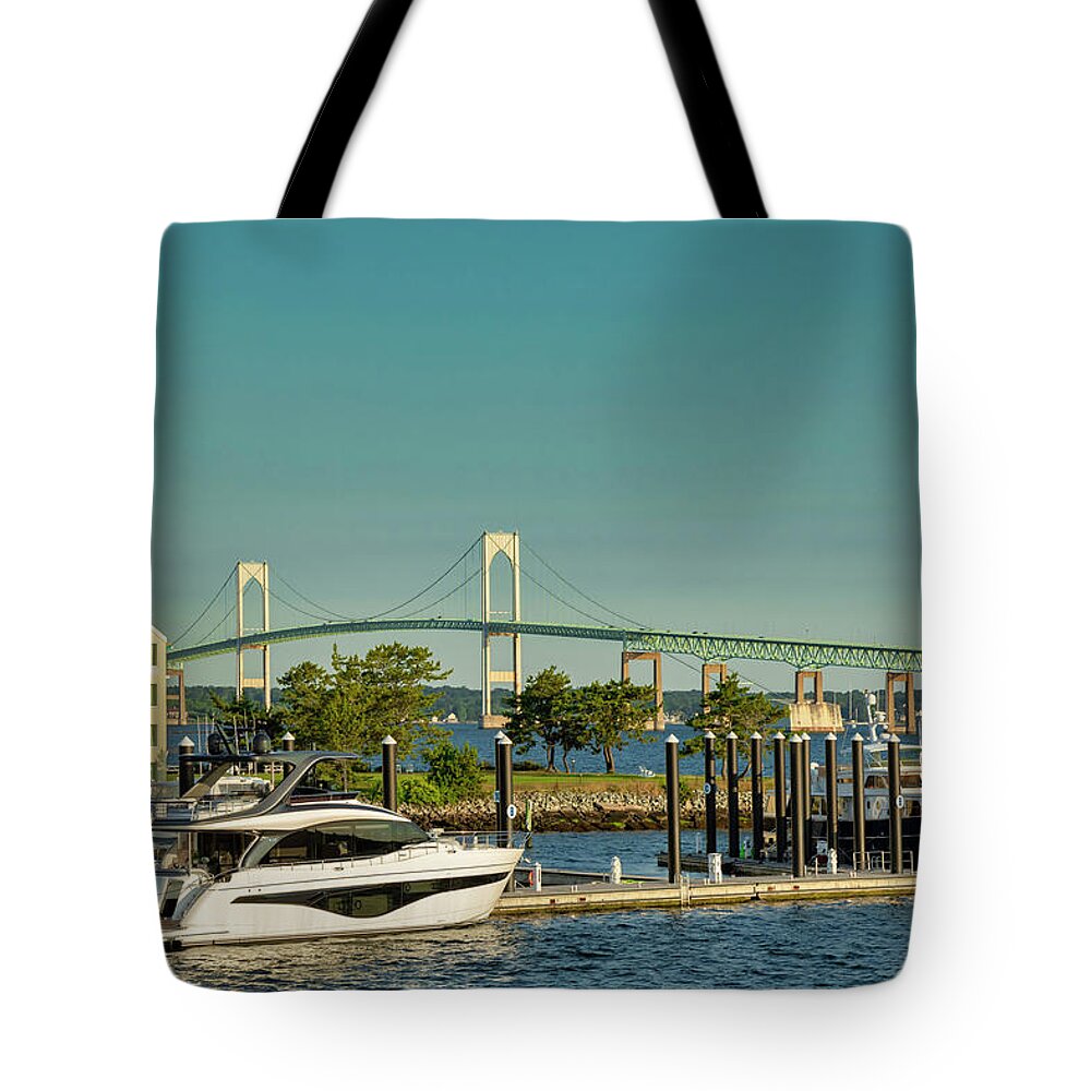 Estock Tote Bag featuring the digital art Rhode Island, Newport, View Of Gurney's Newport Resort & Marina With Claiborne Pell Bridge by Lumiere