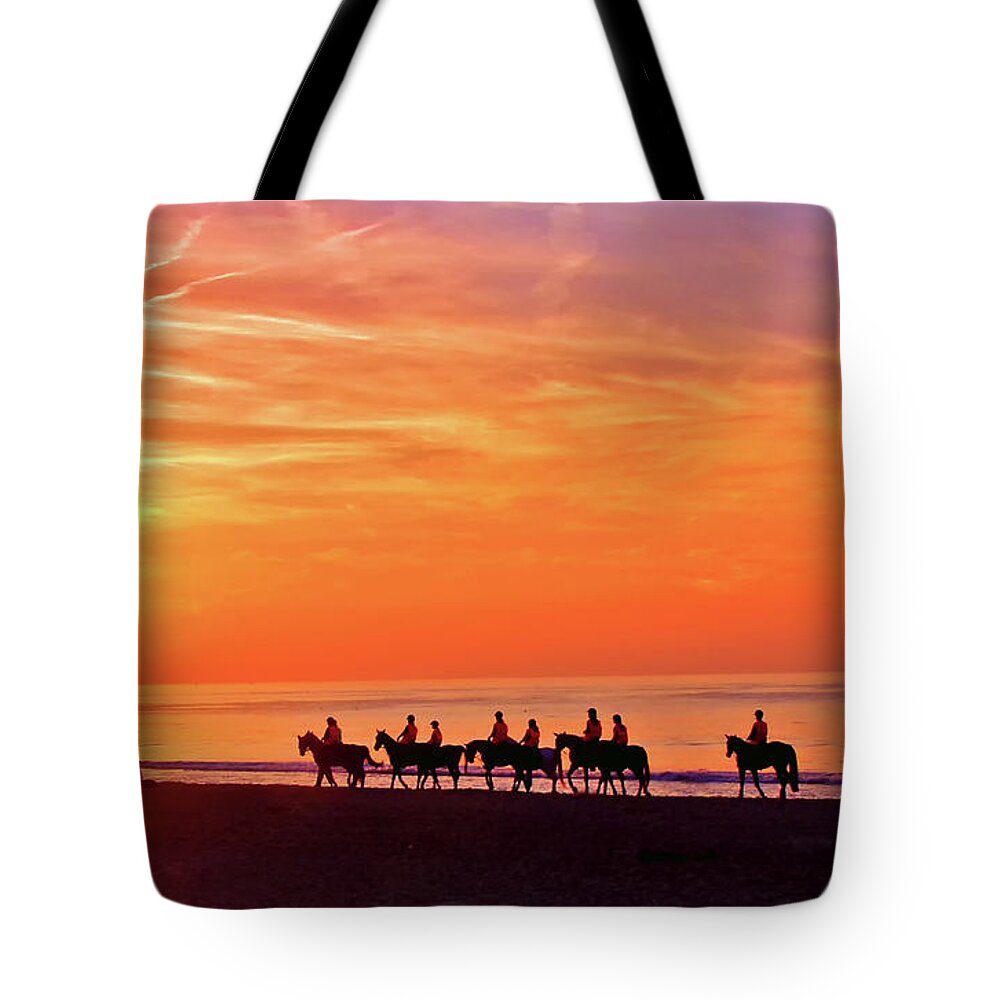 Riding Into The Sun Tote Bag featuring the photograph Riding into the sunset by Nina Ficur Feenan