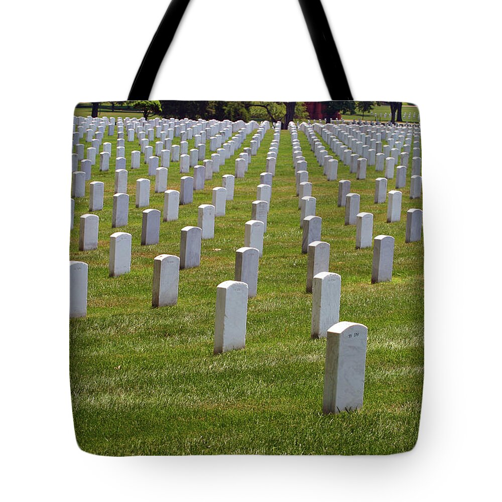 Headstones Tote Bag featuring the photograph Rows of Headstones by Anthony Jones