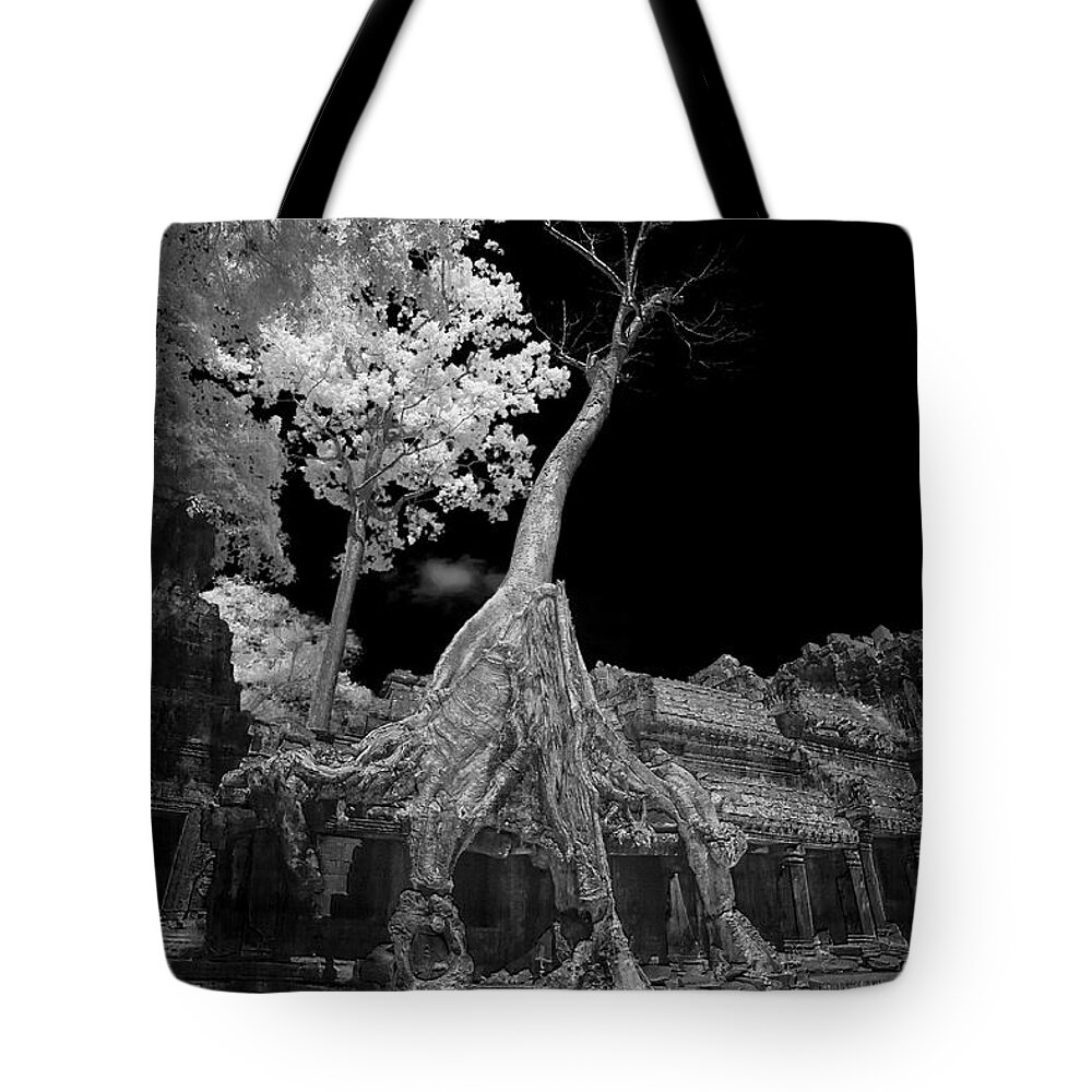 Ancient Tote Bag featuring the photograph Ruins of Preak Khan in Cambodia in black and white infrared by Karen Foley