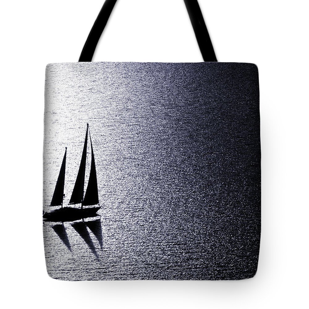 Curve Tote Bag featuring the photograph Sailing At Sunset by Mbbirdy