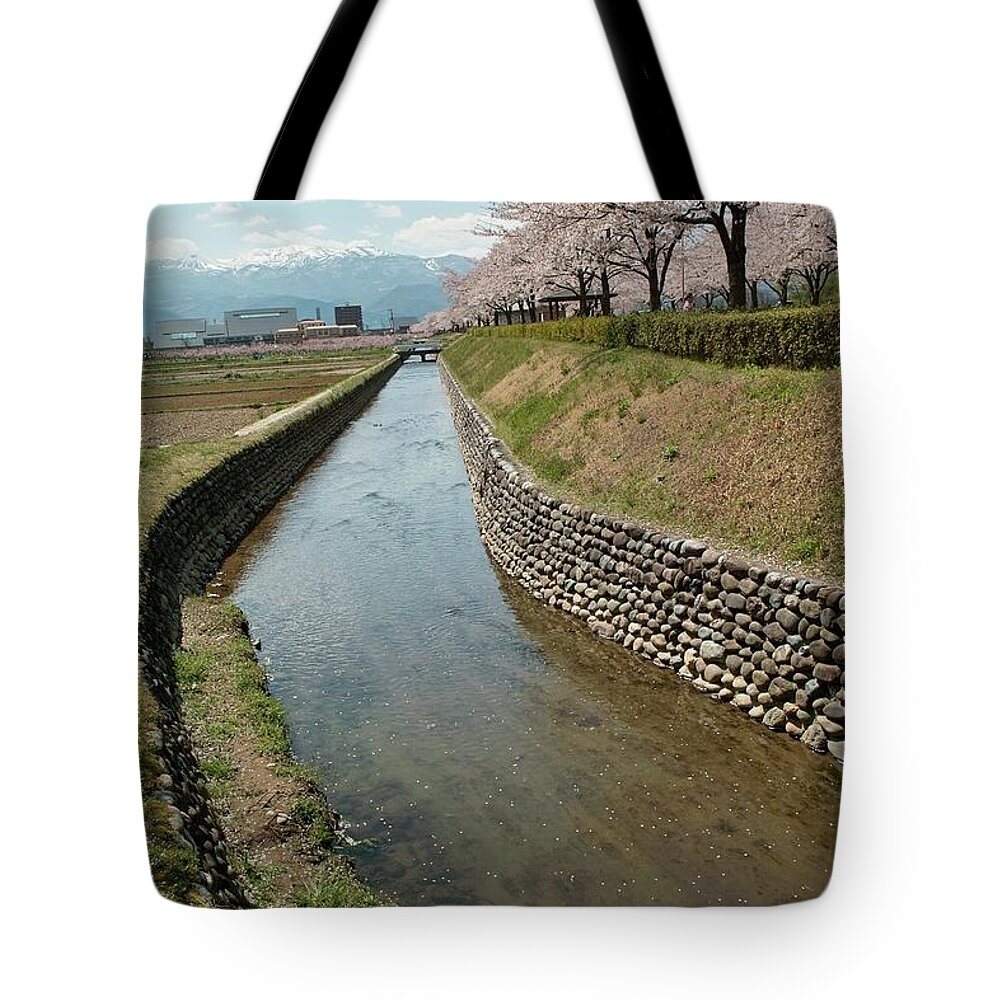 Scenics Tote Bag featuring the photograph Sakura Along Small River by T.kasai@japan