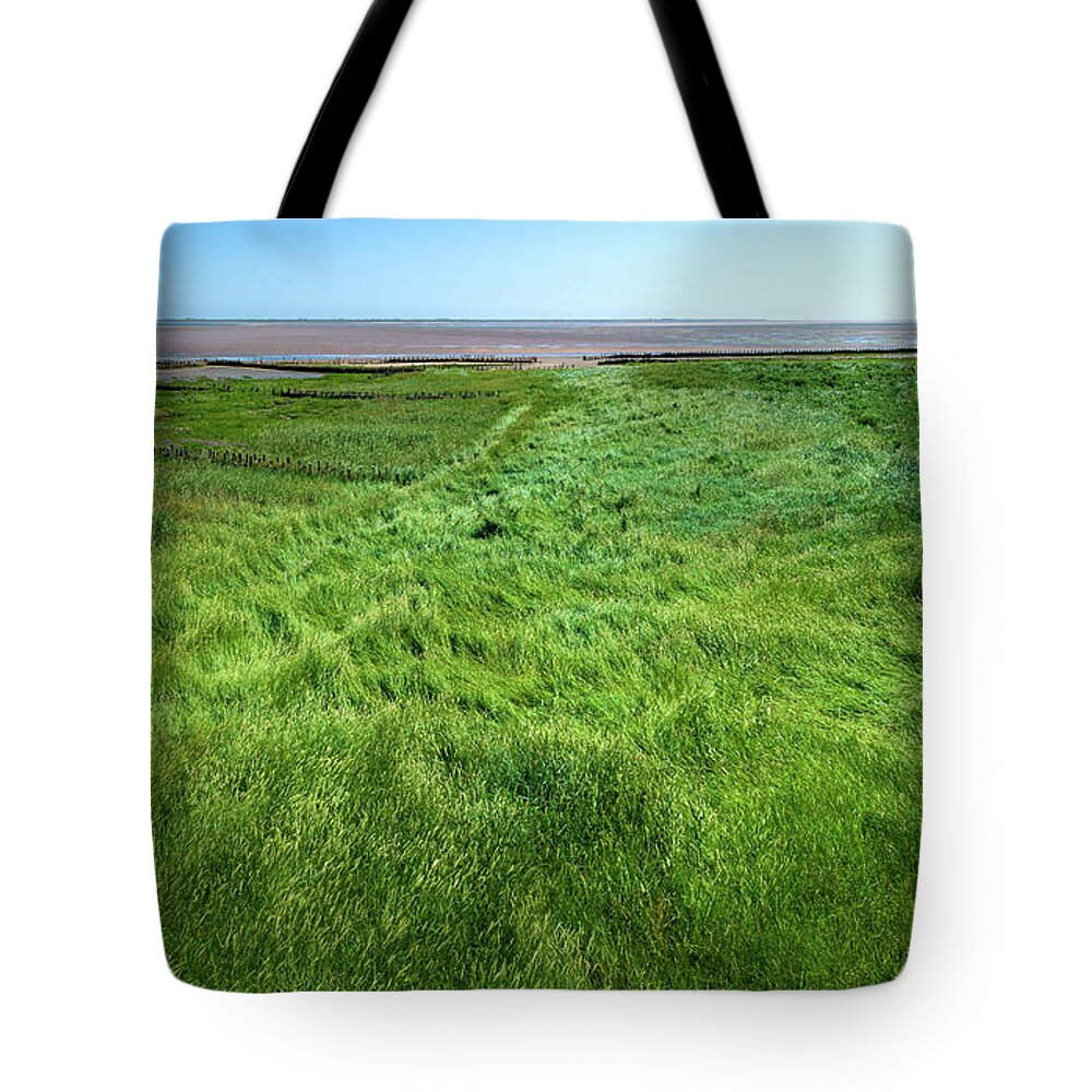 Wadden Sea Tote Bag featuring the photograph Salt marsh on Norderoog by Sun Travels