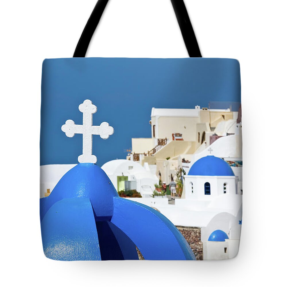 Curve Tote Bag featuring the photograph Santorini Churches And White Cross by Arturbo