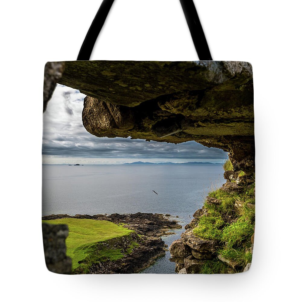 Animal Tote Bag featuring the photograph Scenic View Through Stone Window At Duntulm Castle At The Coast Of The Isle Of Skye In Scotland by Andreas Berthold