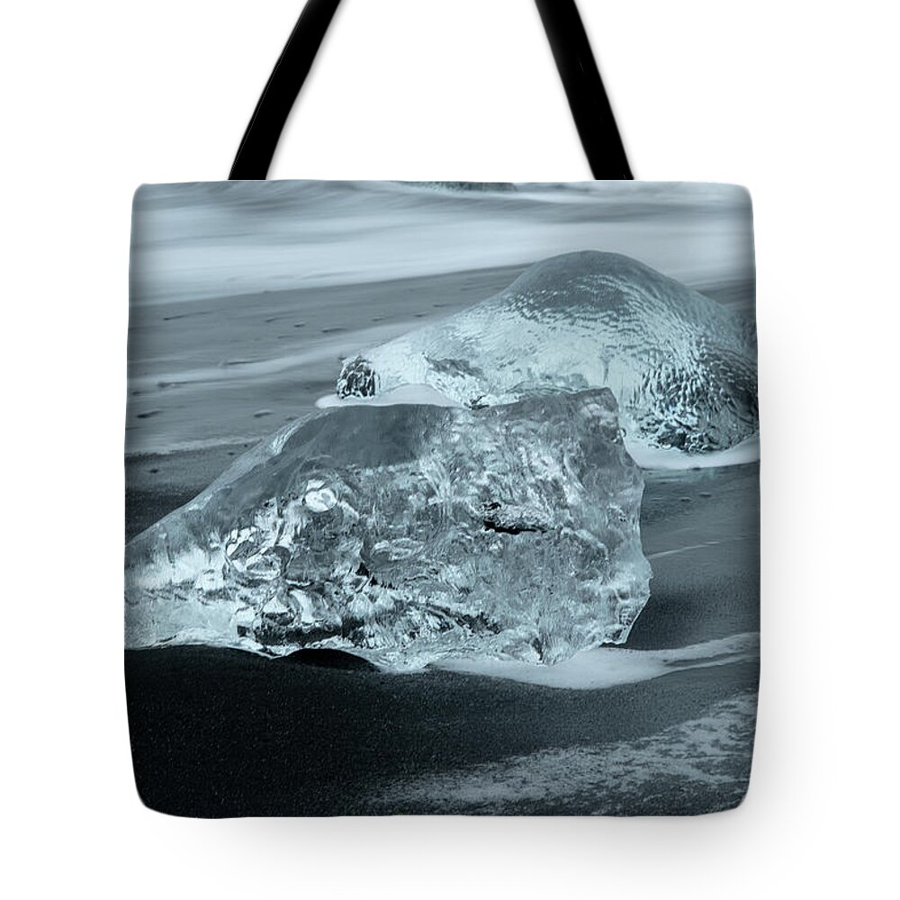 Ice Tote Bag featuring the photograph Sea washed ice in black and white by Mark Hunter