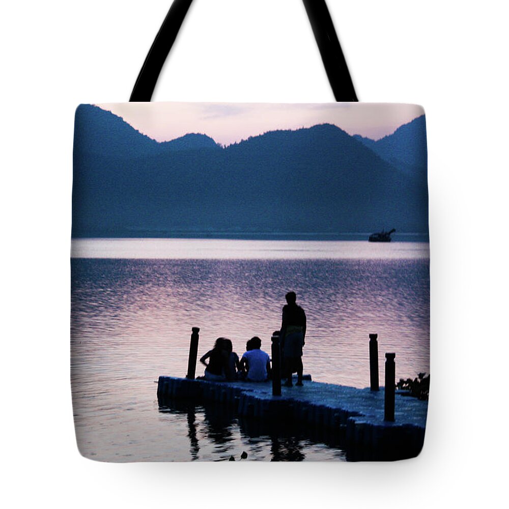 Scenics Tote Bag featuring the photograph Sitting On A Jetty On The River At by Kat Payne Photography