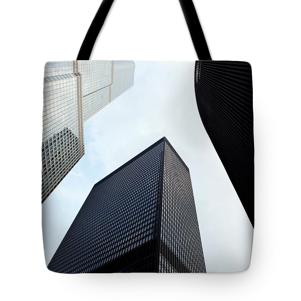 Downtown District Tote Bag featuring the photograph Skyscrapers In Downtown Chicago by Lillisphotography