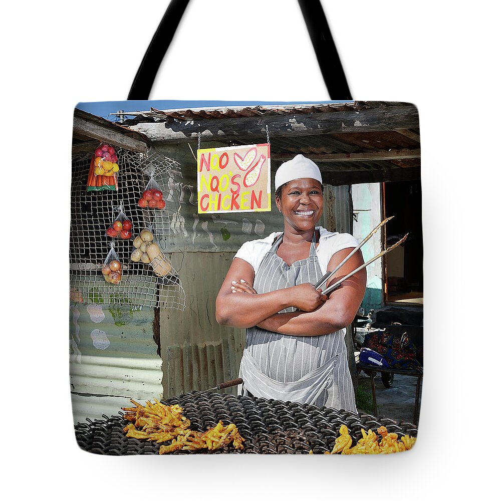 Chicken Meat Tote Bag featuring the photograph Smiley Portrait Of A Woman At Her by David Malan