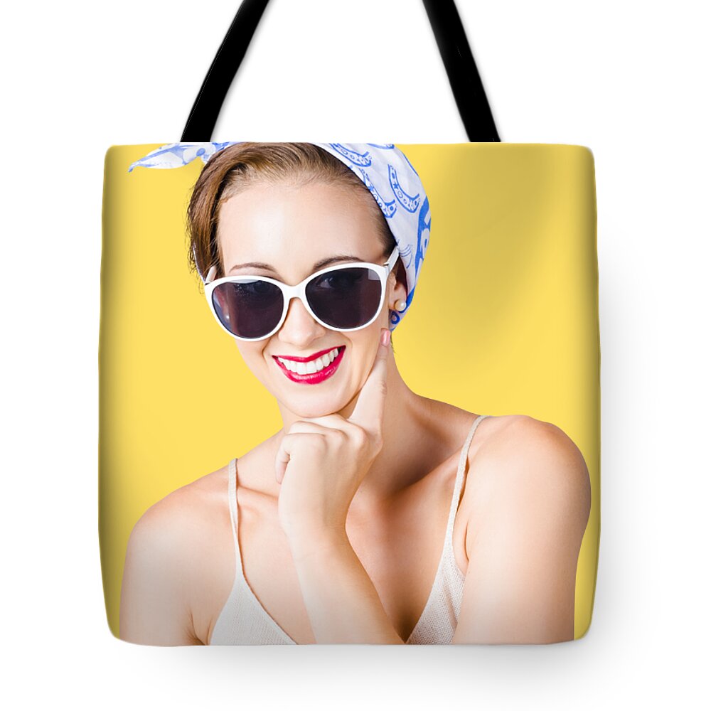 Pin-up Tote Bag featuring the photograph Smiling pin-up girl by Jorgo Photography