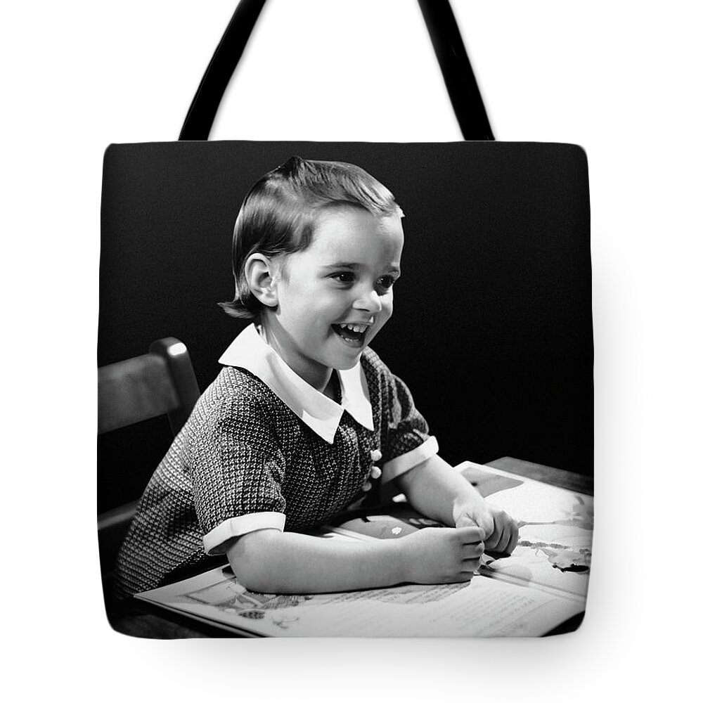 Child Tote Bag featuring the photograph Smiling Young Girl Reading Book by George Marks