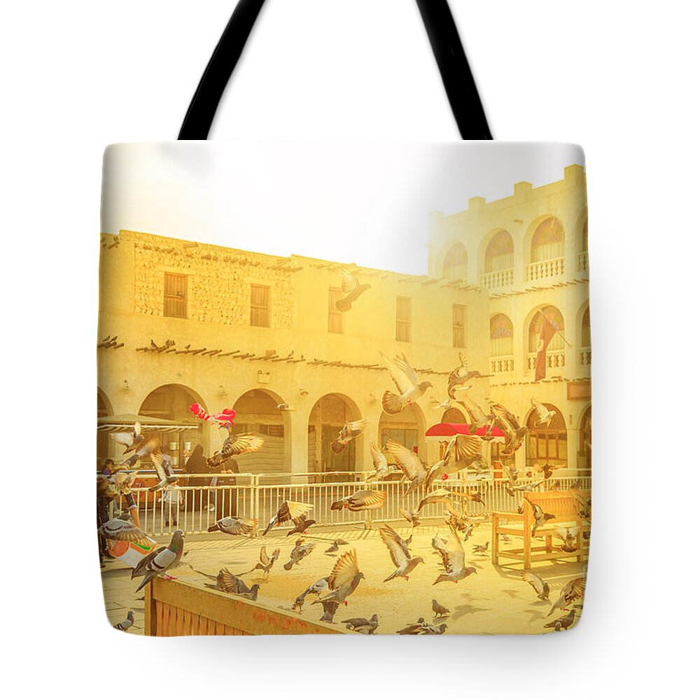 Doha Tote Bag featuring the photograph Souq Waqif Pigeons by Benny Marty