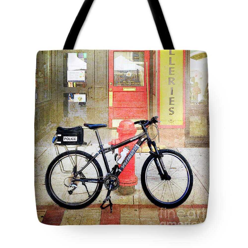 Bicycle Tote Bag featuring the photograph Specialized Police Bicycle by Craig J Satterlee