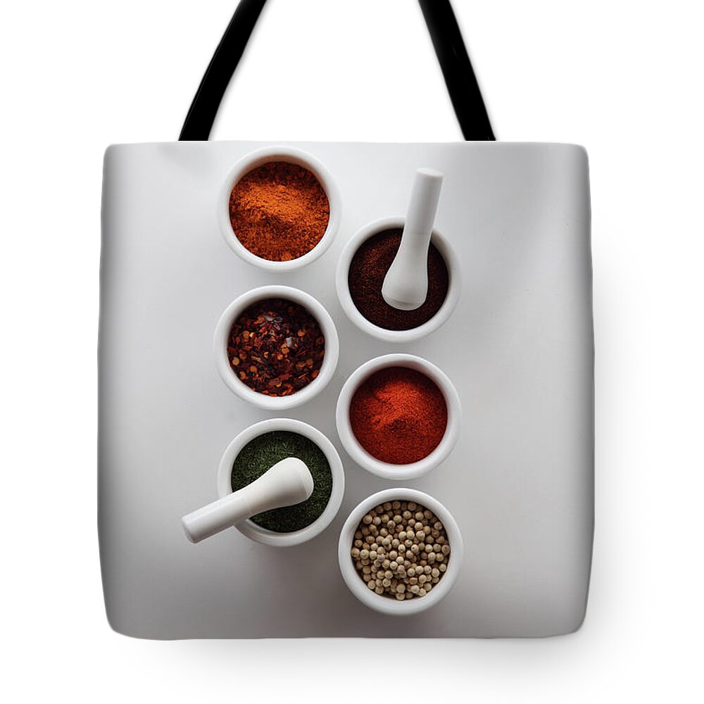 Mortar And Pestle Tote Bag featuring the photograph Spices With Mortars And Pestles by Shana Novak