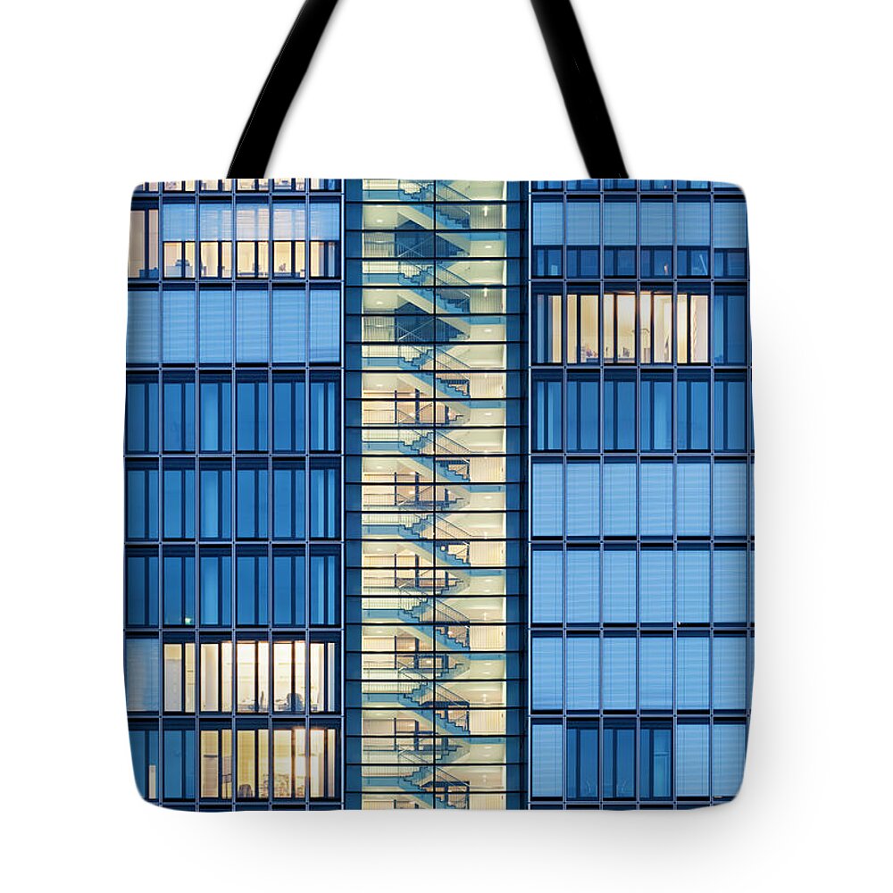 Part Of A Series Tote Bag featuring the photograph Staircase In Office Building At Dusk by Jorg Greuel