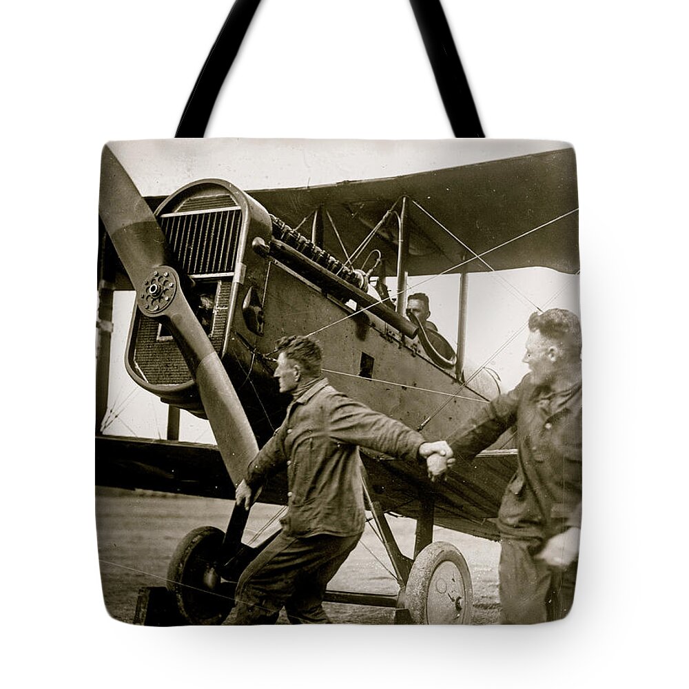 Planes Tote Bag featuring the painting Starting airplane motor by 
