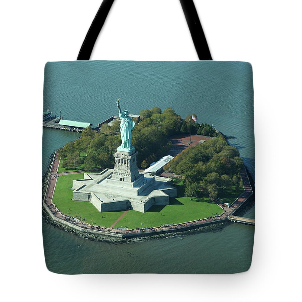 Shadow Tote Bag featuring the photograph Statue Of Liberty by Copyright Www.floridaphoto.com 305.235.7051