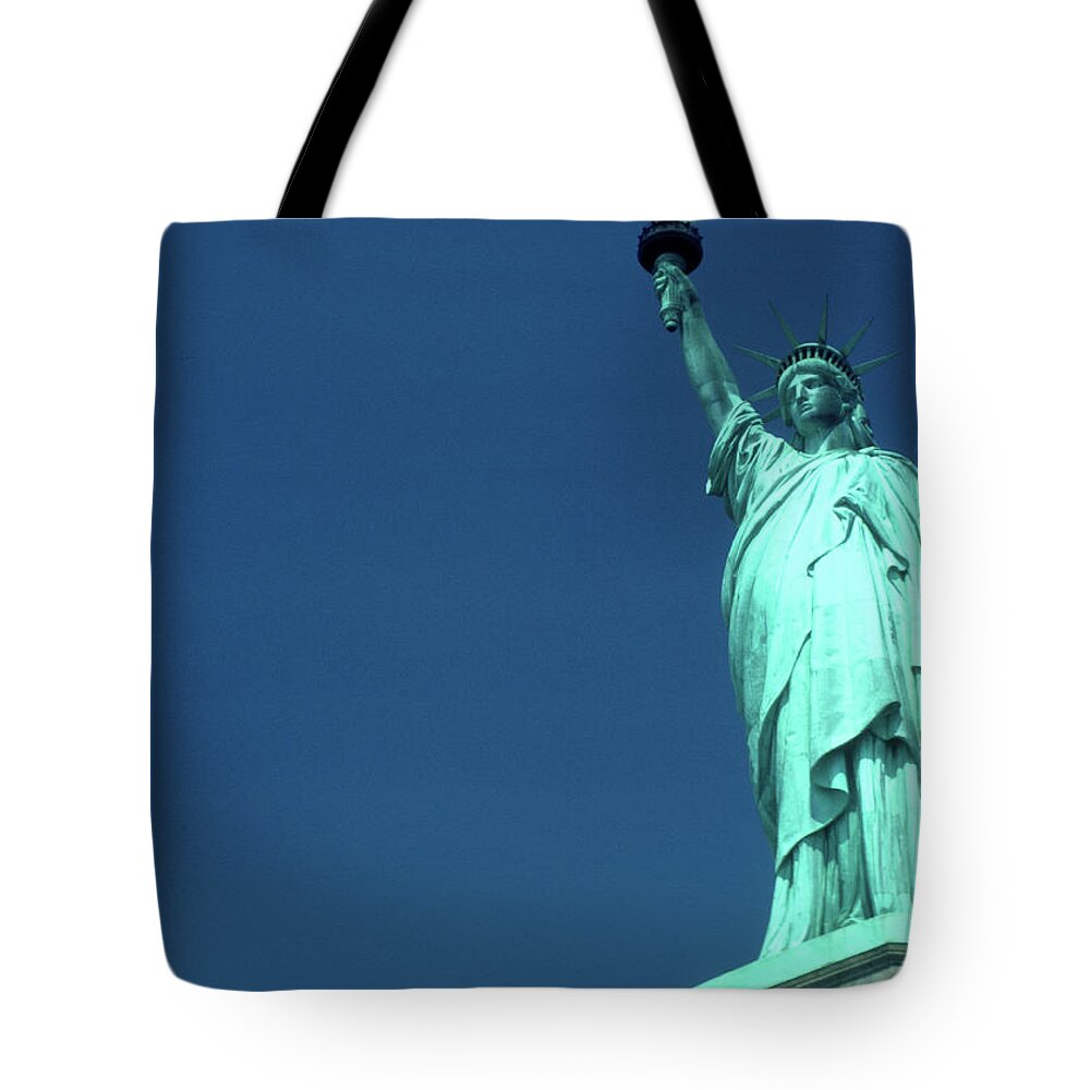 1980-1989 Tote Bag featuring the photograph Statue Of Liberty by Lyle Leduc