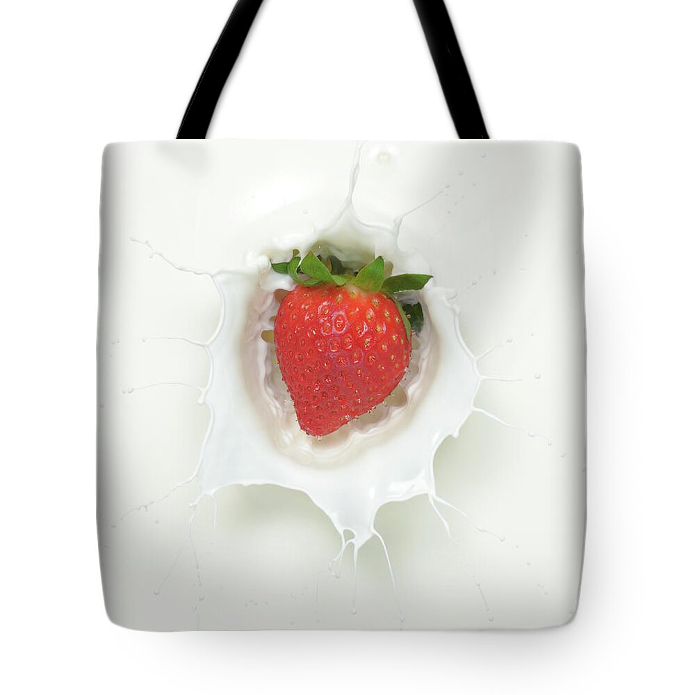 Milk Tote Bag featuring the photograph Strawberry Milk Splash by Chris Stein