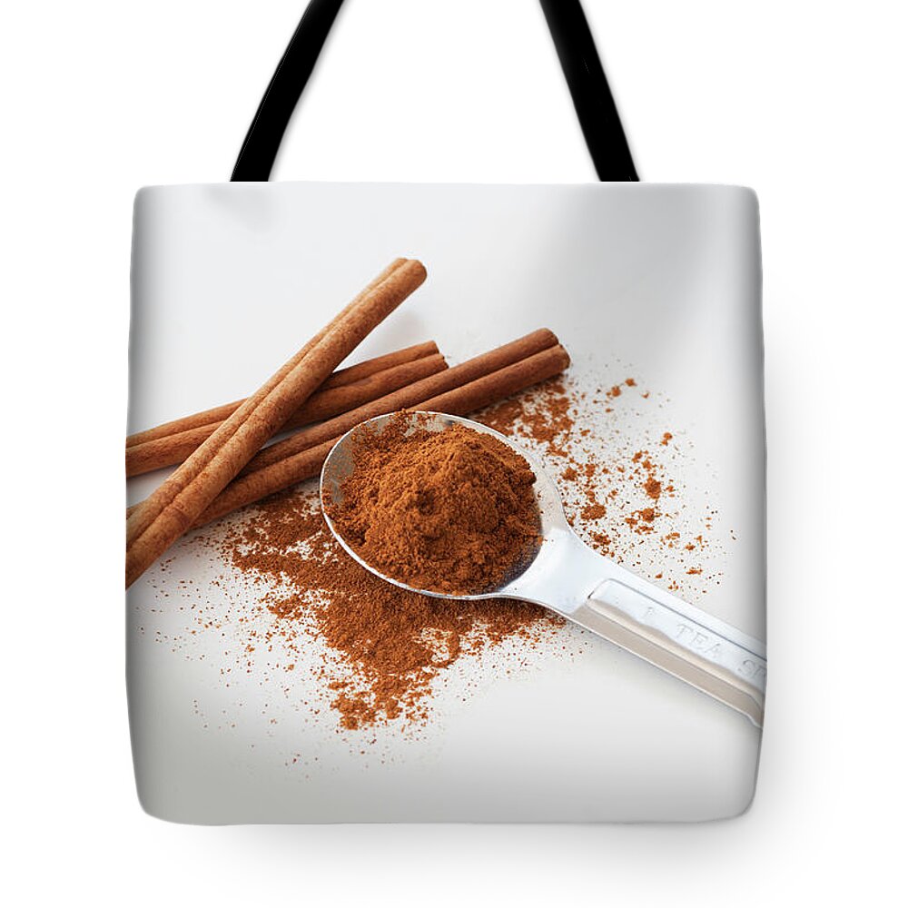 Food And Drink Tote Bag featuring the photograph Studio Shot Of Cinnamon Stick And by Tetra Images