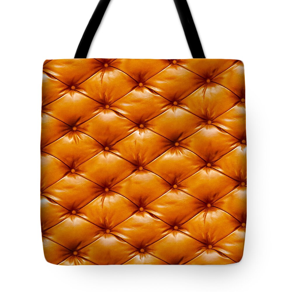 Material Tote Bag featuring the photograph Stylish Red Upholstery by Bukkerka