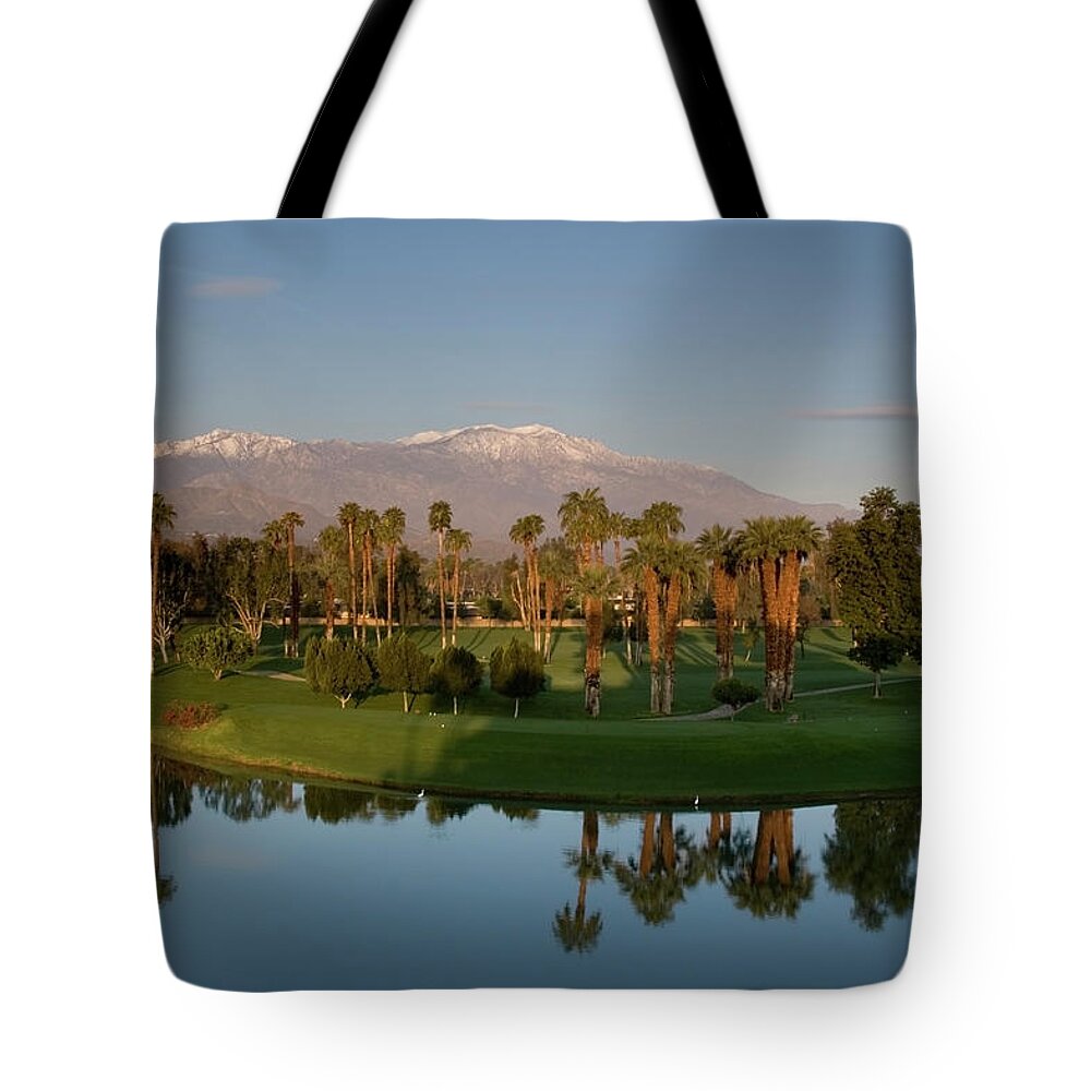 Sand Trap Tote Bag featuring the photograph Sunrise Over Desert Golf Resort by Blyons