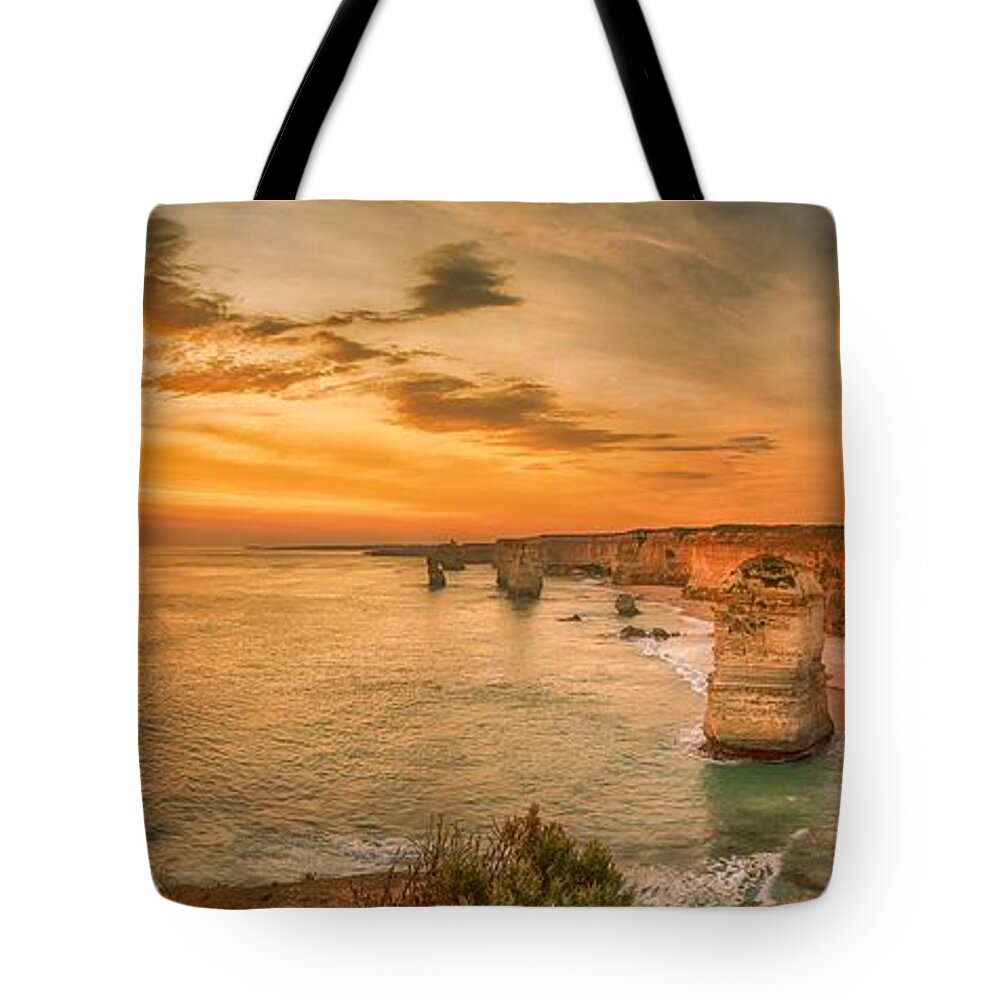 12apostles Tote Bag featuring the photograph Sunset at The Twelve Apostles by Chris Cousins