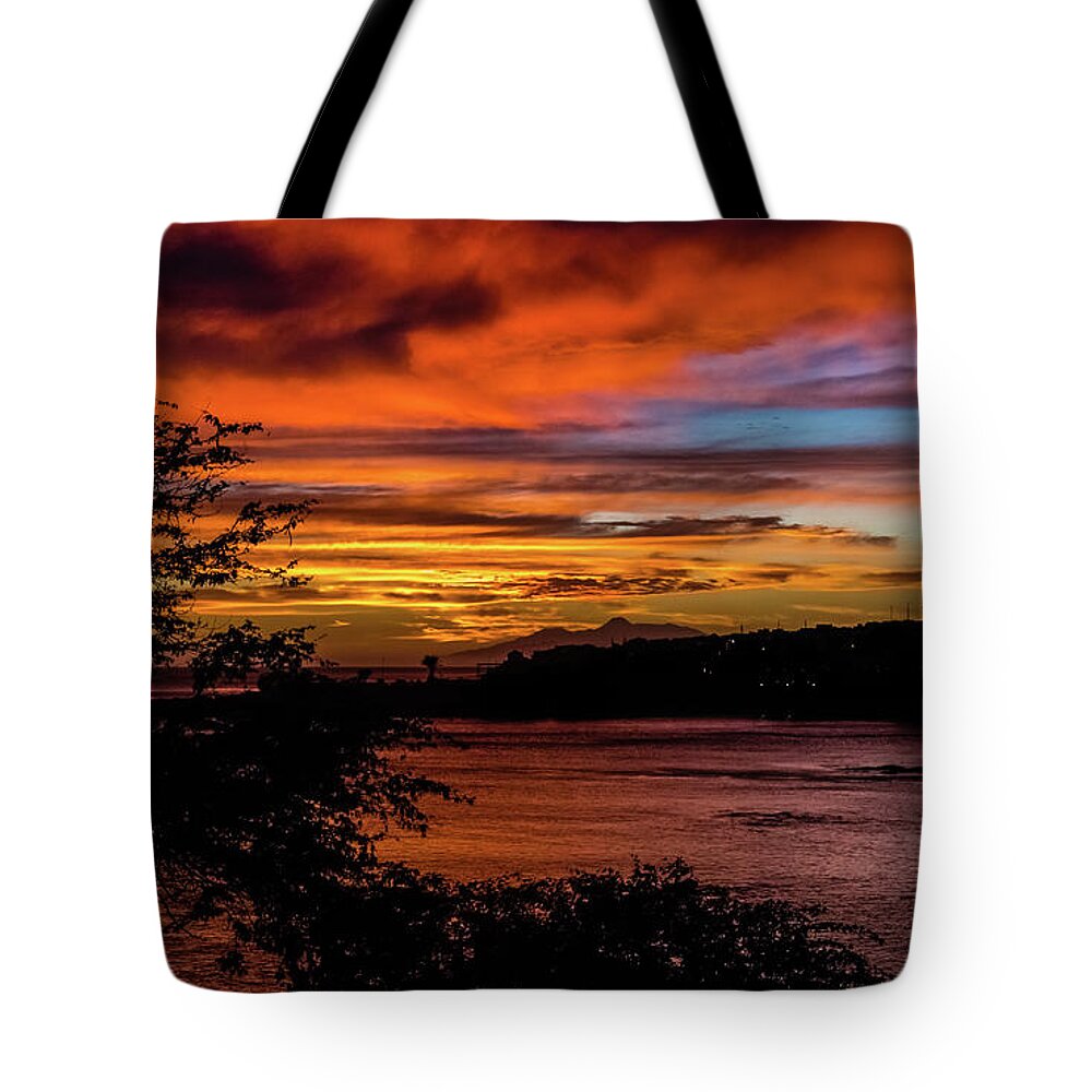 Sunset Tote Bag featuring the photograph Sunset in Praia, Cape Verde by Lyl Dil Creations