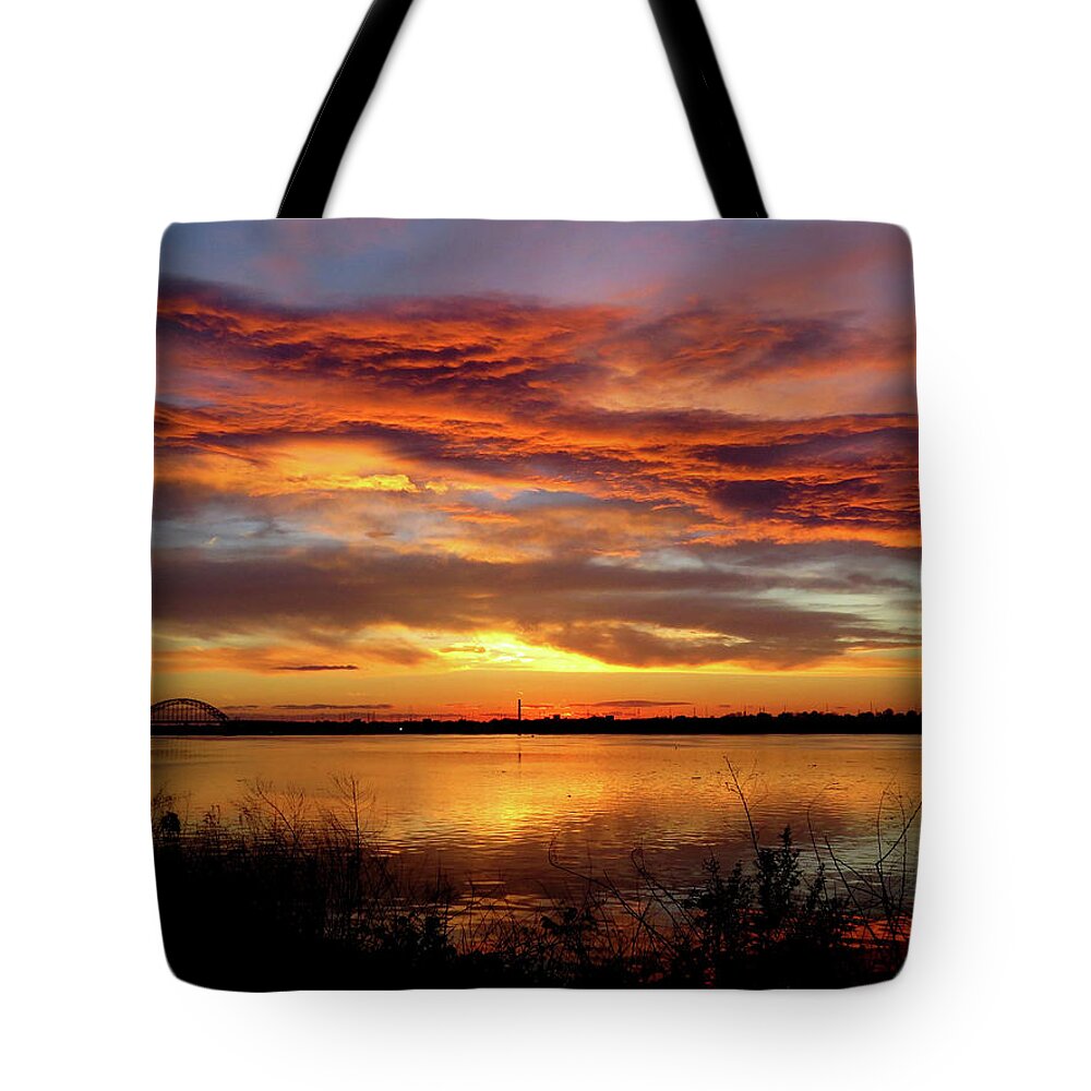 Sunset Tote Bag featuring the photograph Sunset on the Delaware No. One by Linda Stern