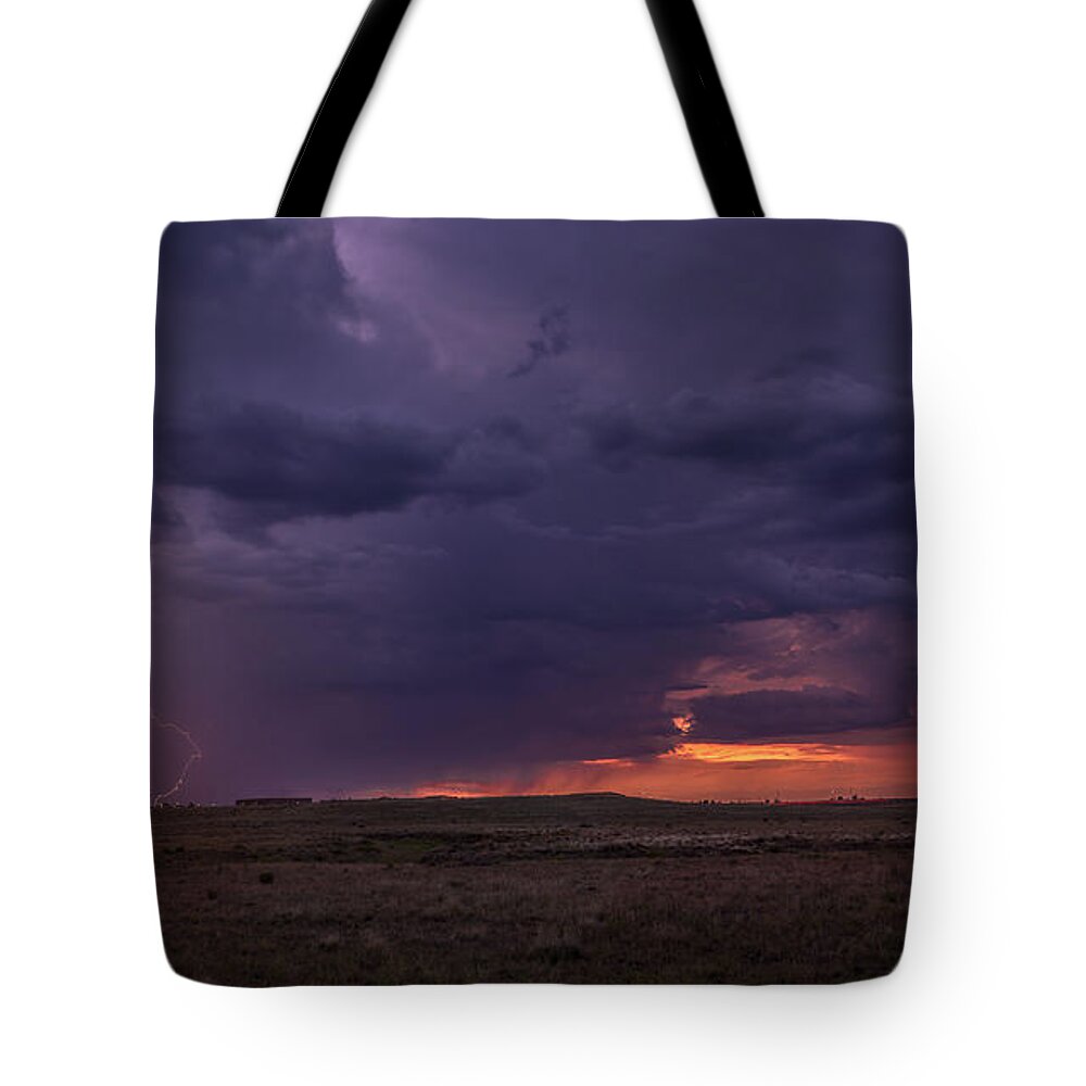 Sunset Tote Bag featuring the photograph Sunset Strike by Aaron Burrows