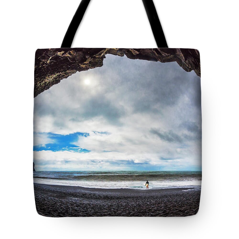 Clouds Tote Bag featuring the photograph Surfer at Black Sands by Debra and Dave Vanderlaan