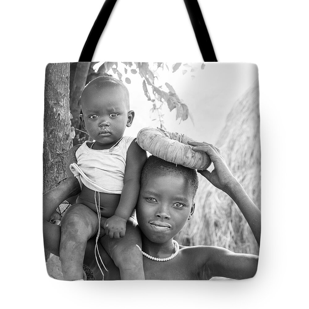 Portrait Tote Bag featuring the photograph Suri girl and baby by Mache Del Campo