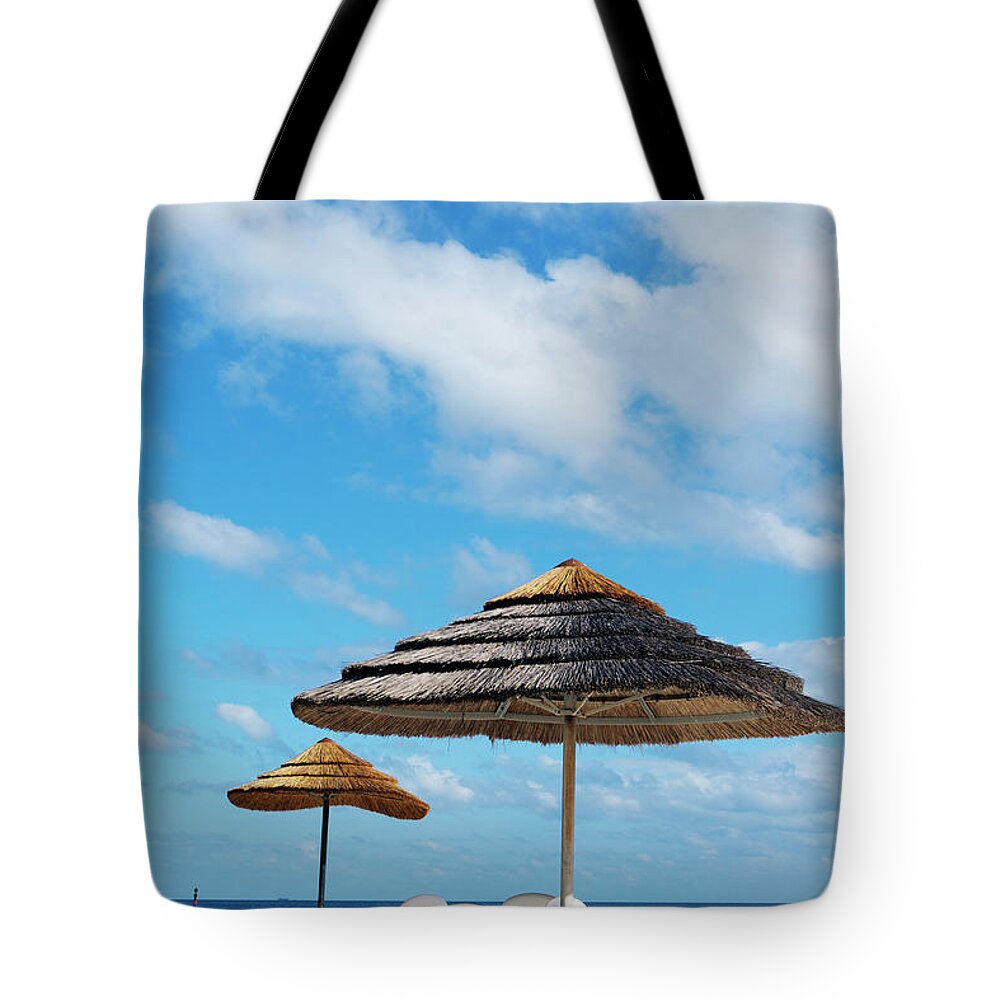 Tranquility Tote Bag featuring the photograph Table And Chairs On Sand, Amedee Island by Oliver Strewe