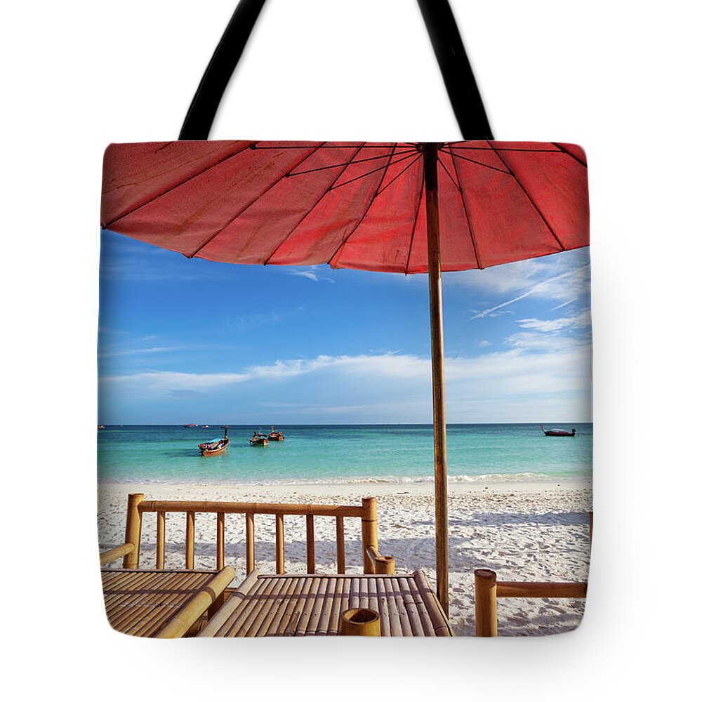 Pattaya Tote Bag featuring the photograph Table By The Beach In Thailand by Holgs